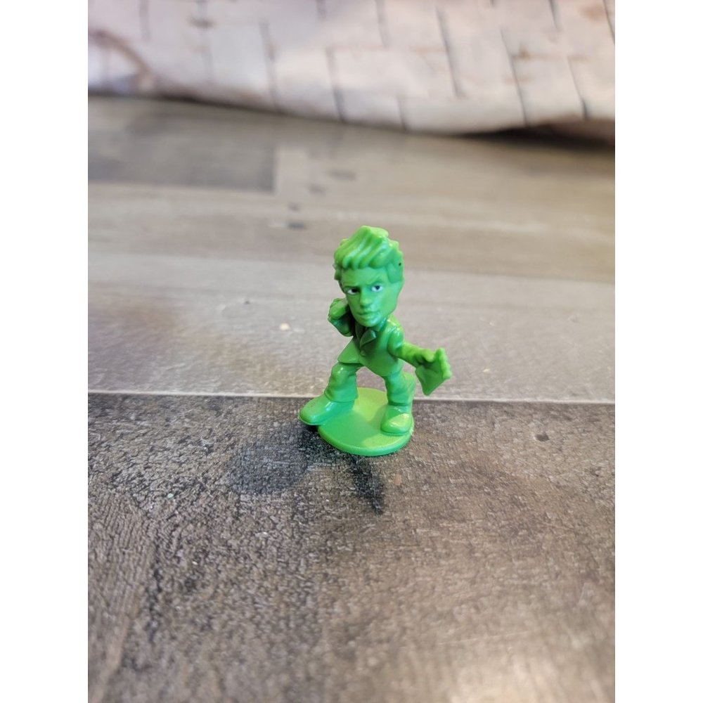 Green man accountant guy toy figure